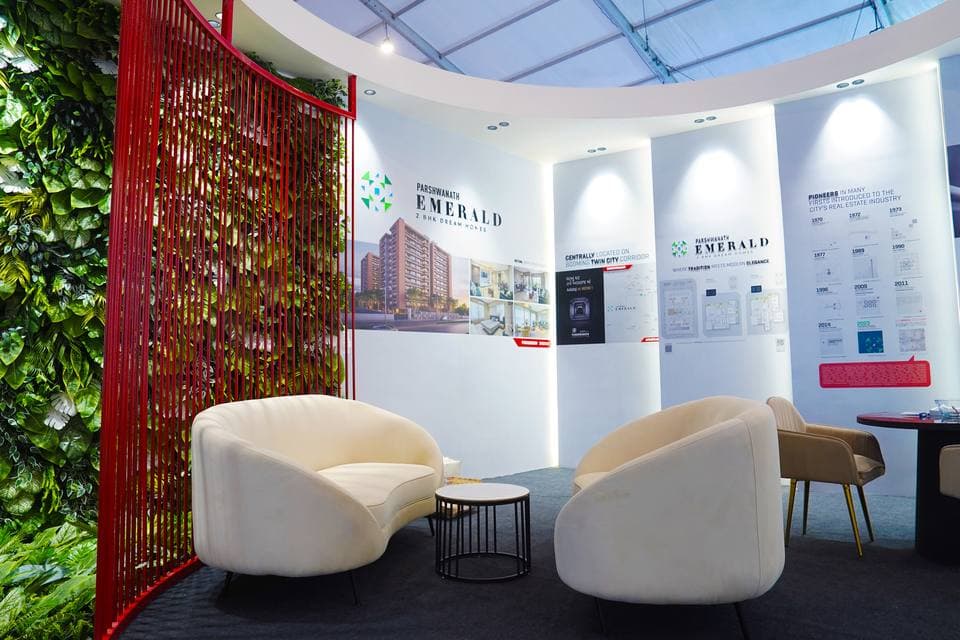 Premium exhibition consultation lounge with feature partitions at a 54 sqm property expo