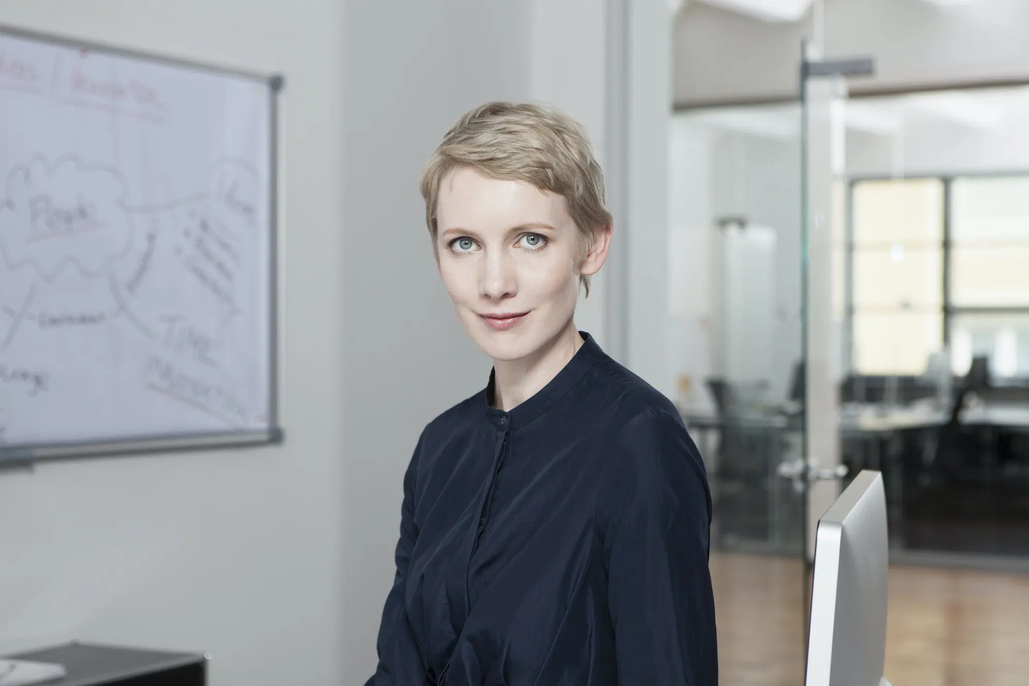 Germany, Munich, Businesswoman in office