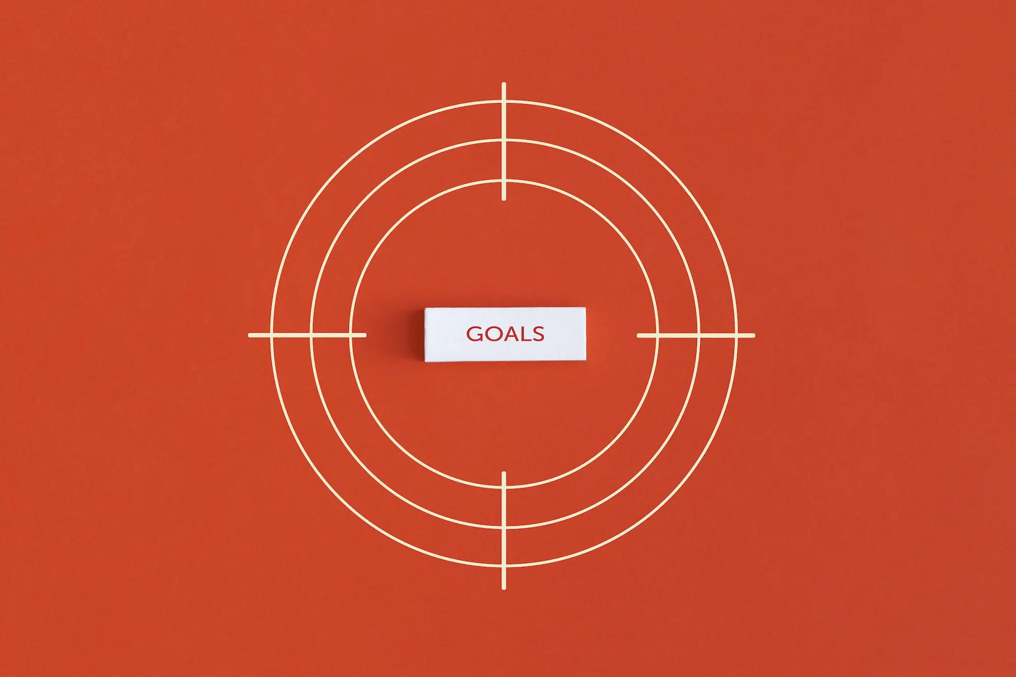 Goal word in the center of the target on red background.